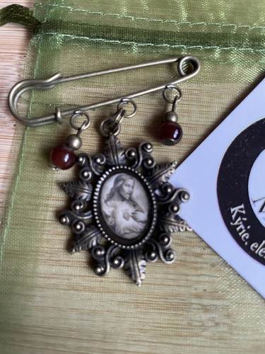Holy medal brooch the - medal,